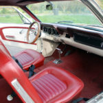 Front interior showing seats and dash