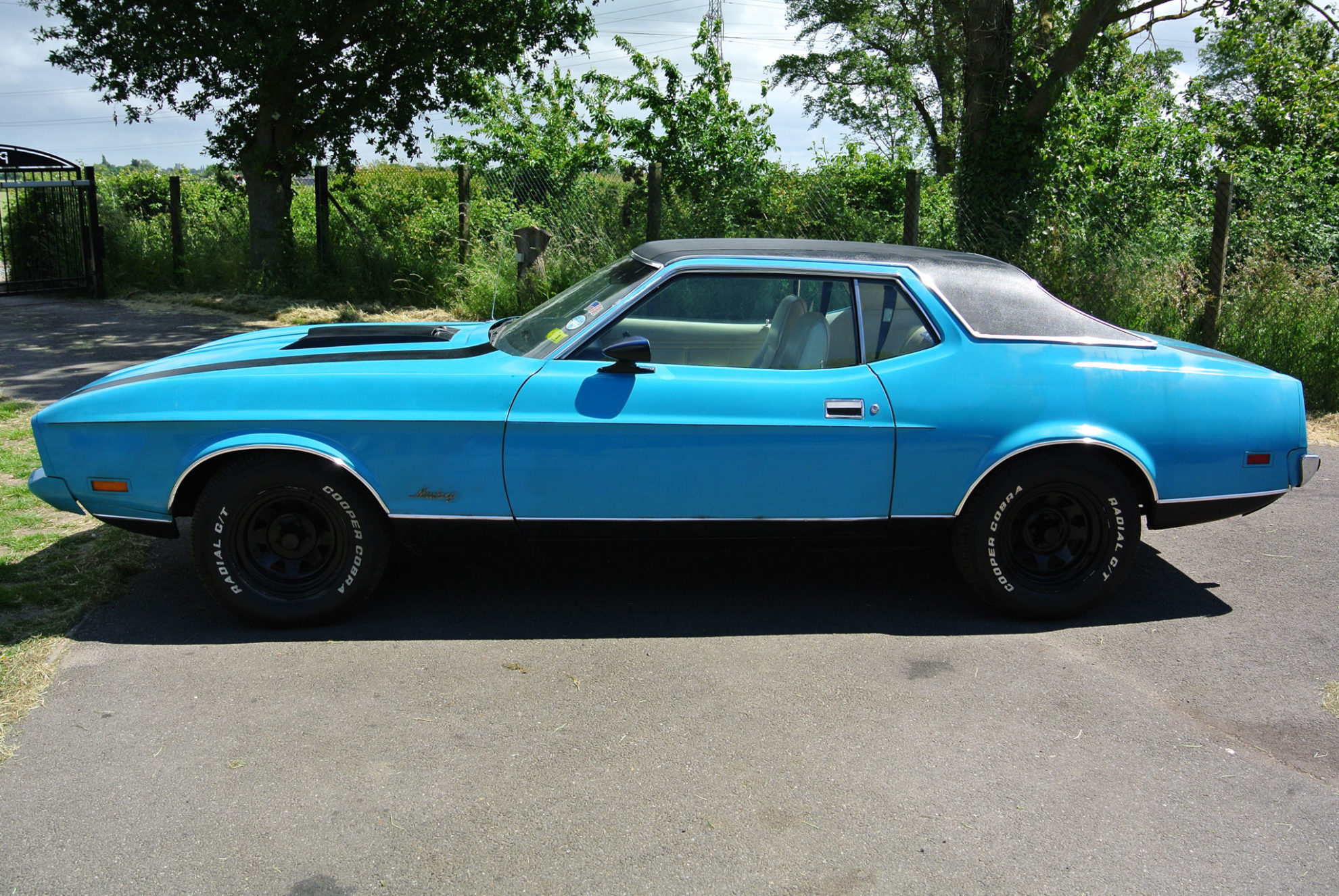 SOLD: 1973 Blue V8 Auto Mustang Grande - Oakwood Classics